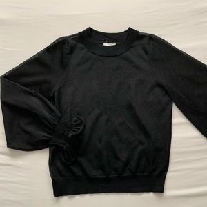 Women’s Sheer Black Mockneck Blouse with Bell Sleeves